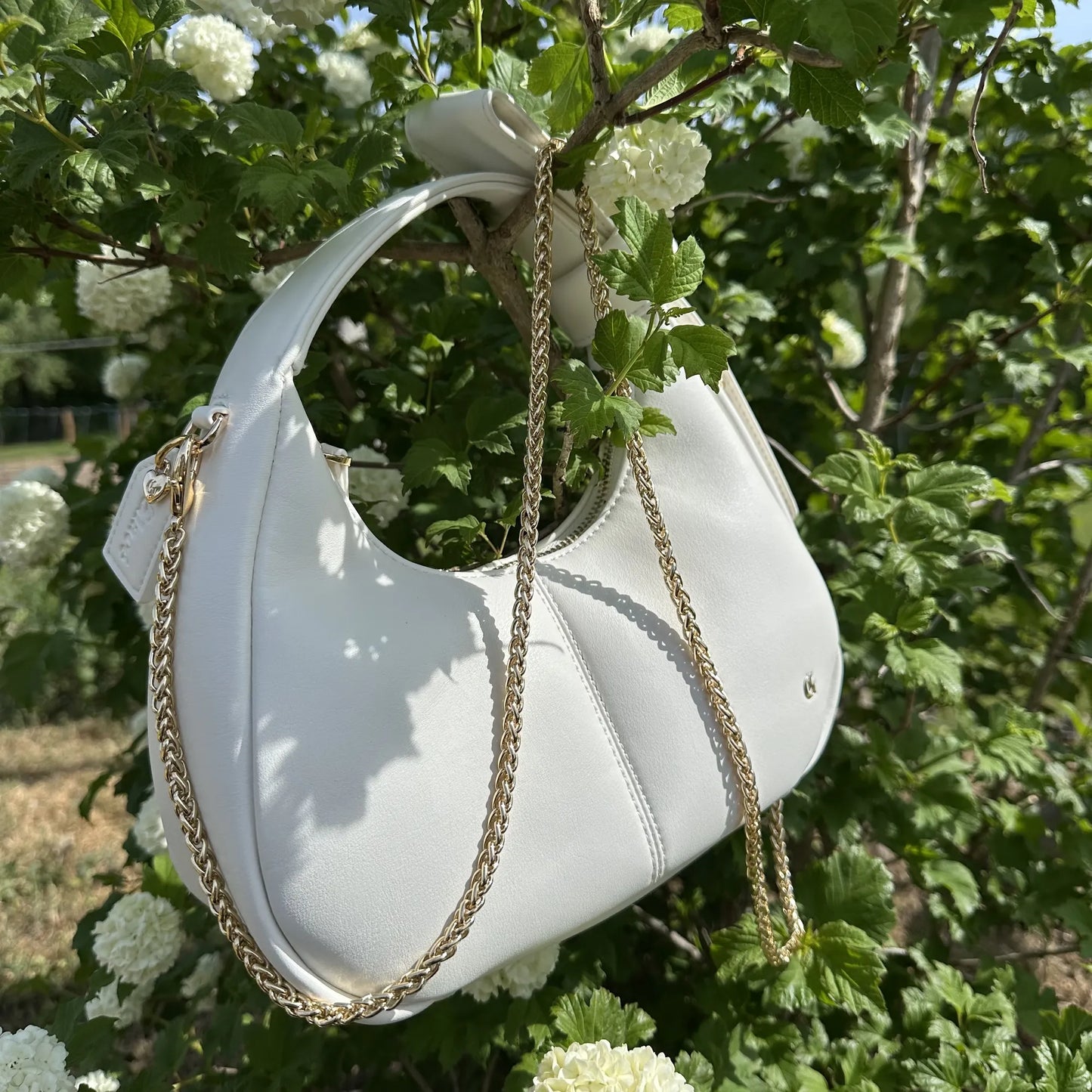 Chaine-bandoulière du sac "Le Croissant"
